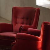 Pair of modern Danish lounge chairs, cherry red velvet, 1950s.