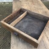 Antique farmhouse table in solid oak with tapered legs and 1 drawer at the end.