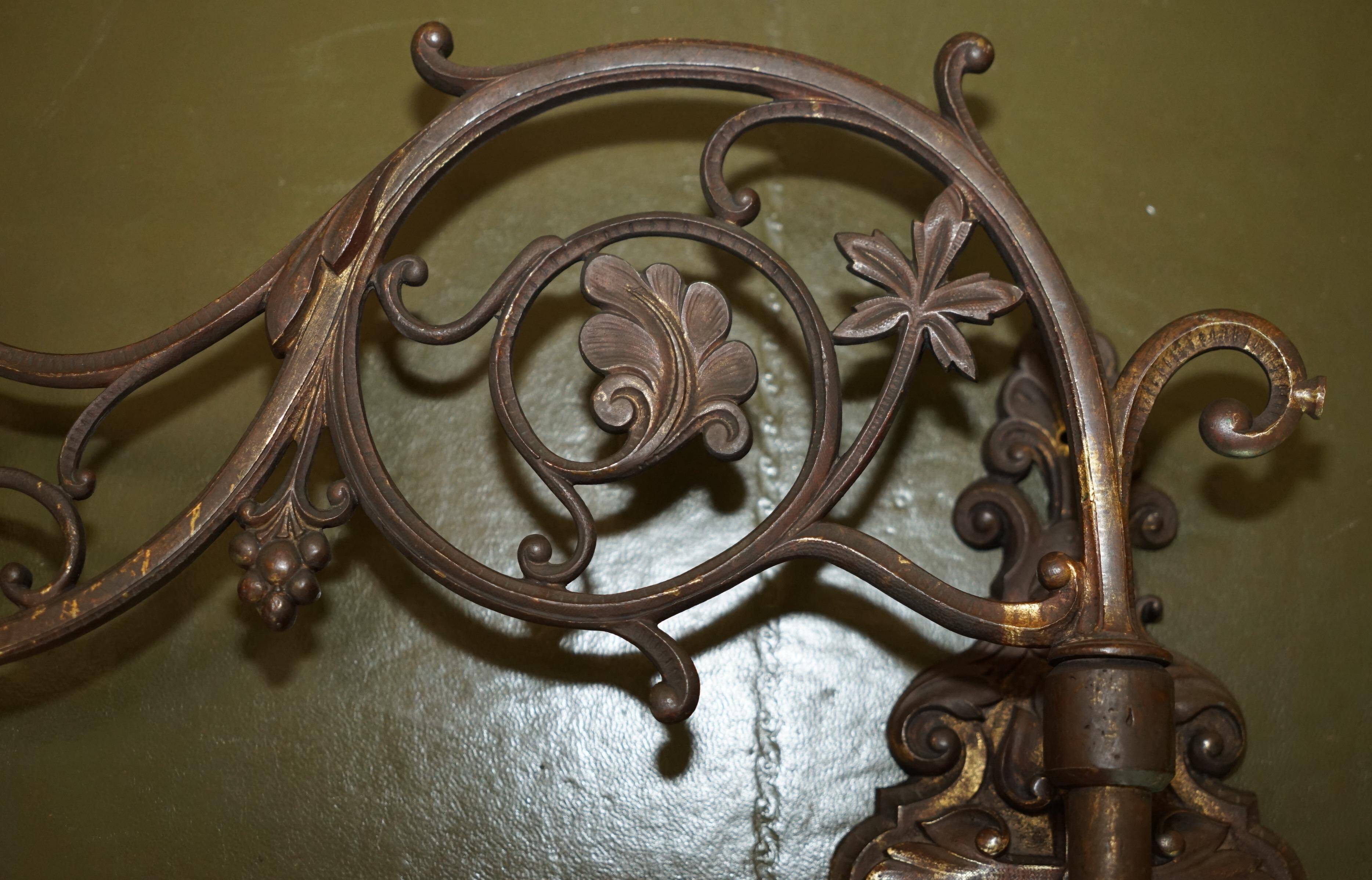 Pair of antique wall sconces in gilded bronze.