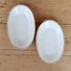 Vintage white porcelain trays with a golden rim.