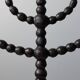 Candelabrum in the shape of a spool, skilfully forged in menorah style.