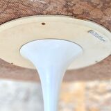 Round table in red marble by Eero Saarinen for Knoll