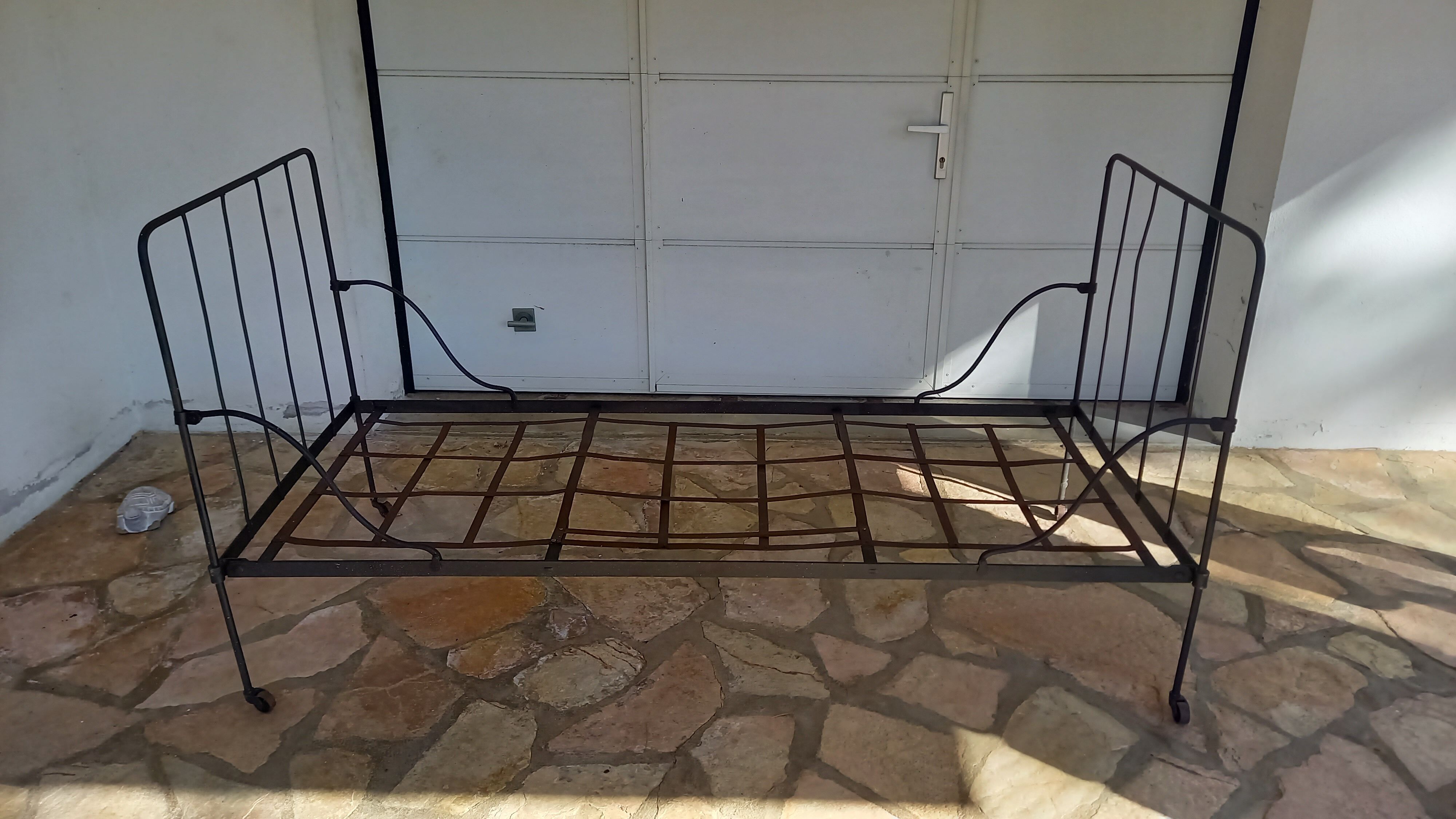 Wrought iron bed with mattress