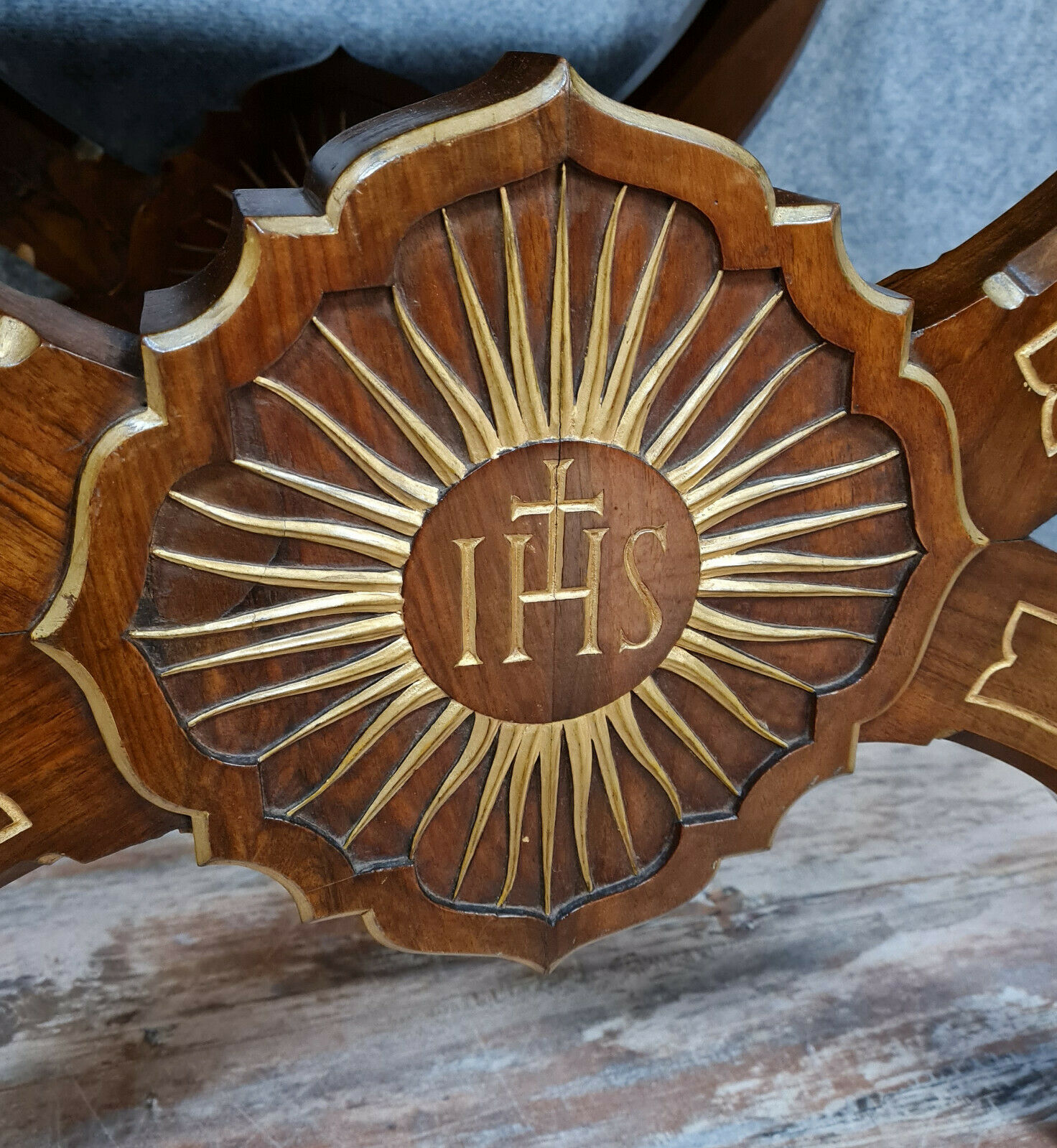 Bishop's curule armchair in solid walnut and gilding highlights with religious symbols