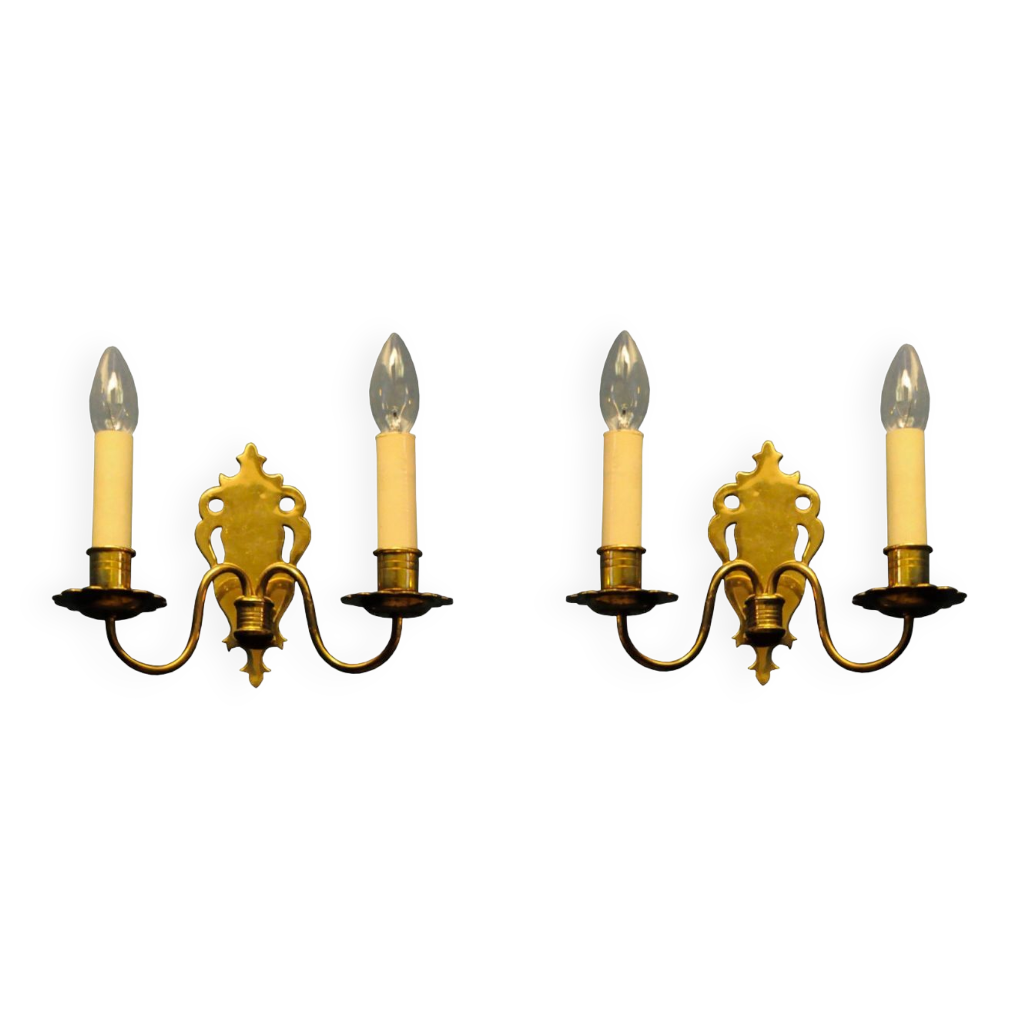 Pair of brass wall sconces by Schroder & Co