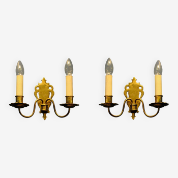 Pair of brass wall sconces by Schroder & Co