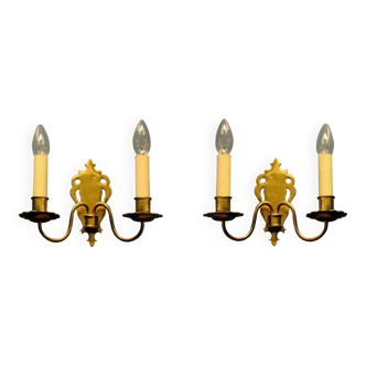 Pair of brass wall sconces by Schroder & Co