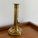 Old brass push candle holder
