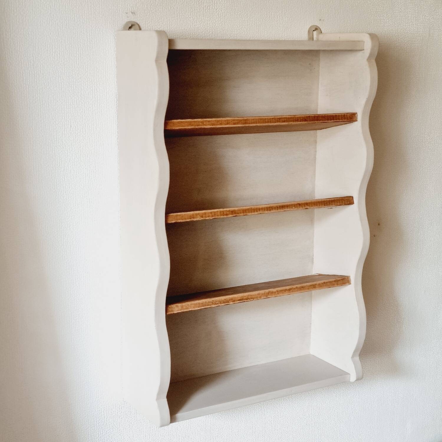 Linen-colored wooden shelf
