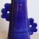 Handmade abstract ceramic vase with asymmetrical floral handles in midnight blue