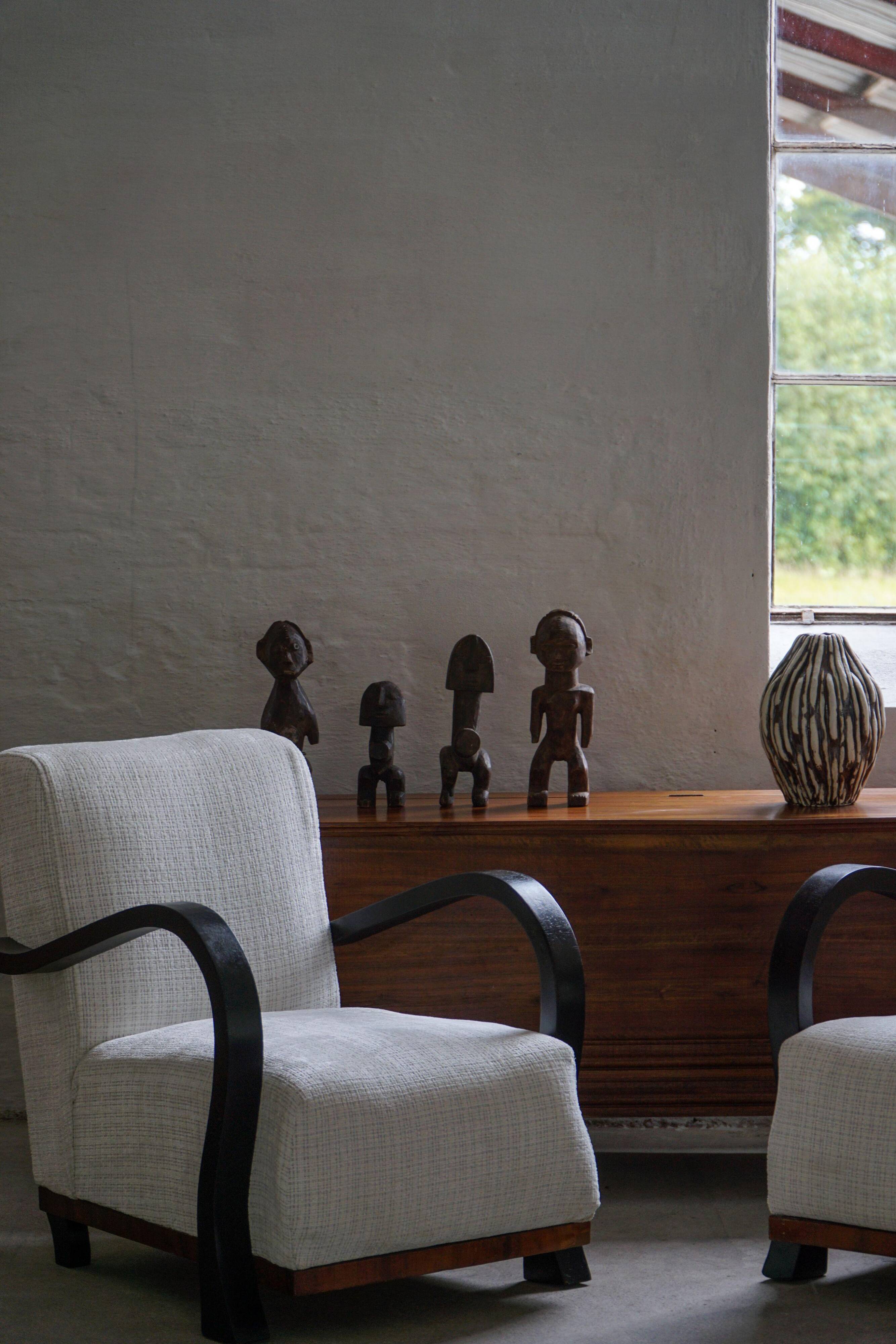 Set of 4 decorative handcrafted African wooden sculptures, mid-century.