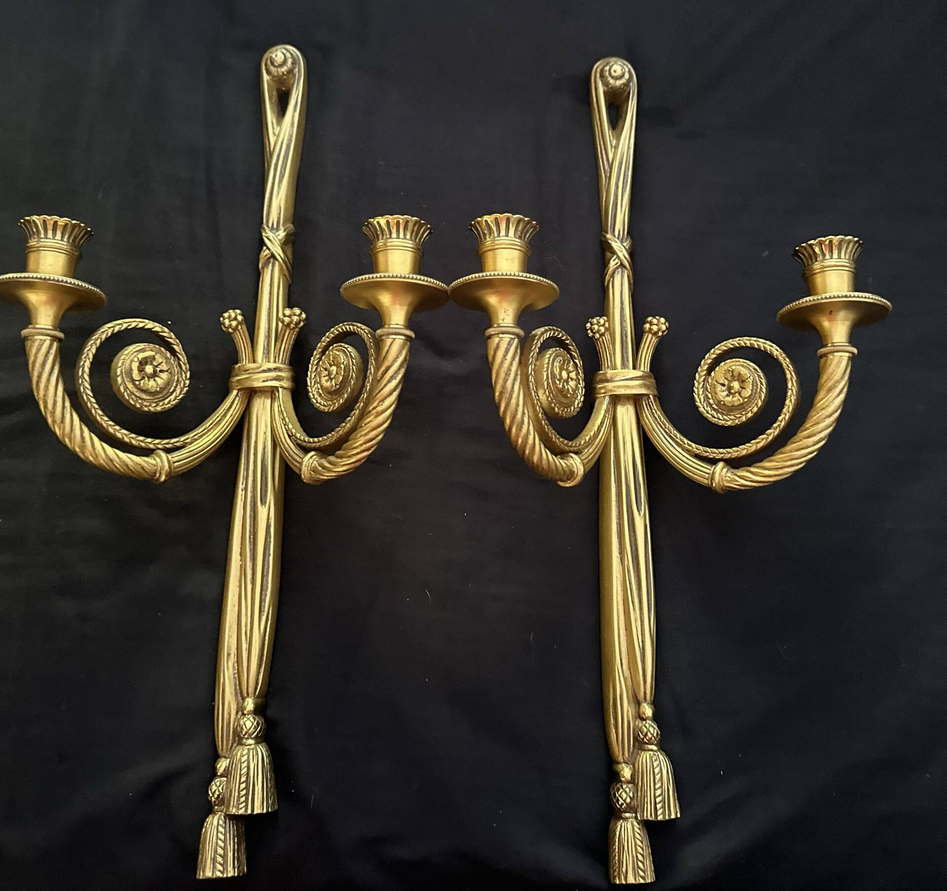 Pair of gilded bronze wall sconces in the Louis XVI style. 20th century.