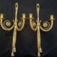 Pair of gilded bronze wall sconces in the Louis XVI style. 20th century.