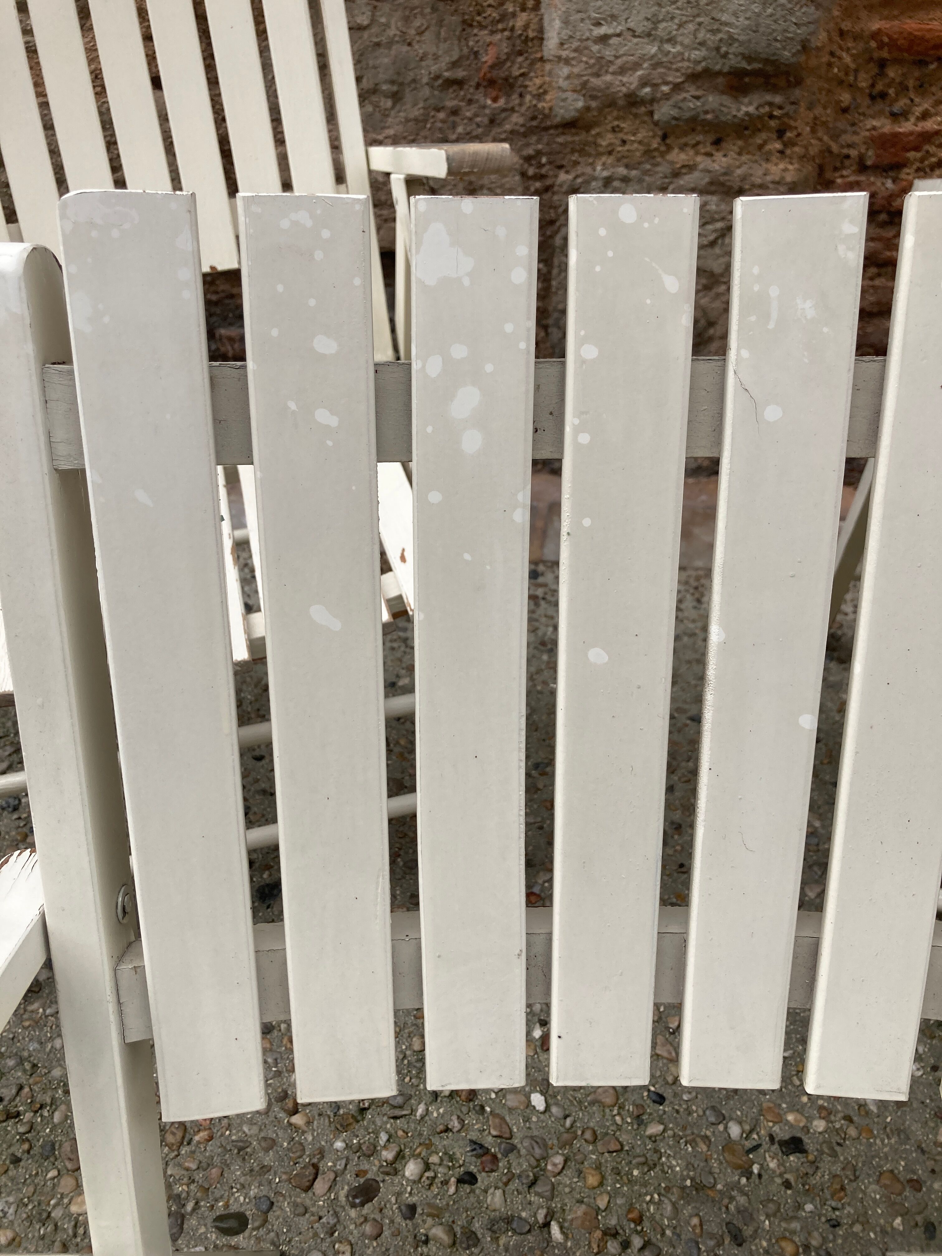 Five wooden garden armchairs