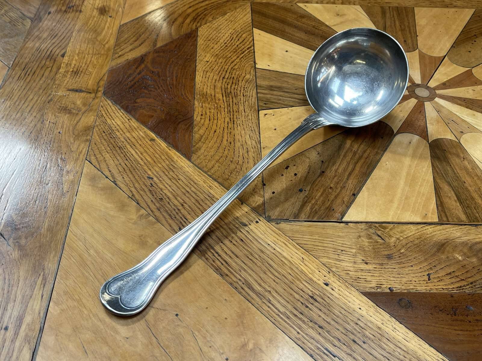 Christofle brand ladle in silver metal - Letter B on the back.