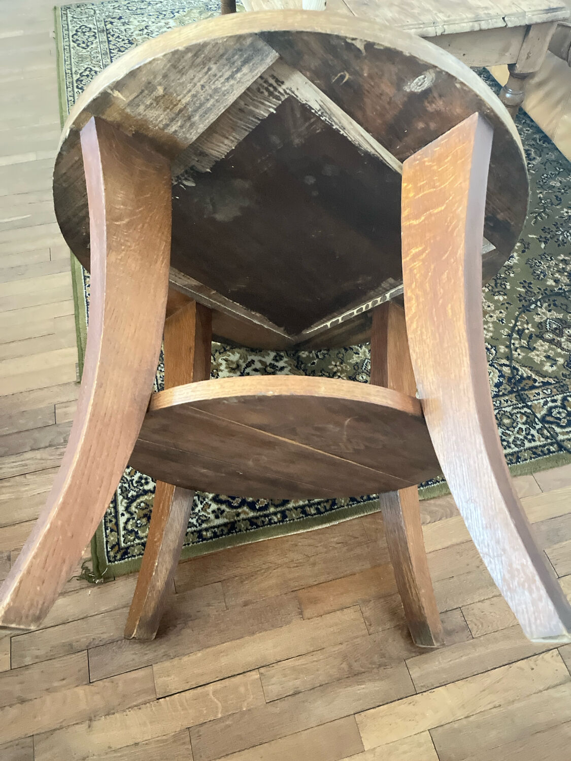 Low round art deco table in honey wood