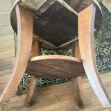 Low round art deco table in honey wood