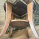 Low round art deco table in honey wood