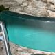 Pair of green vinyl and chrome armchairs, mid-century