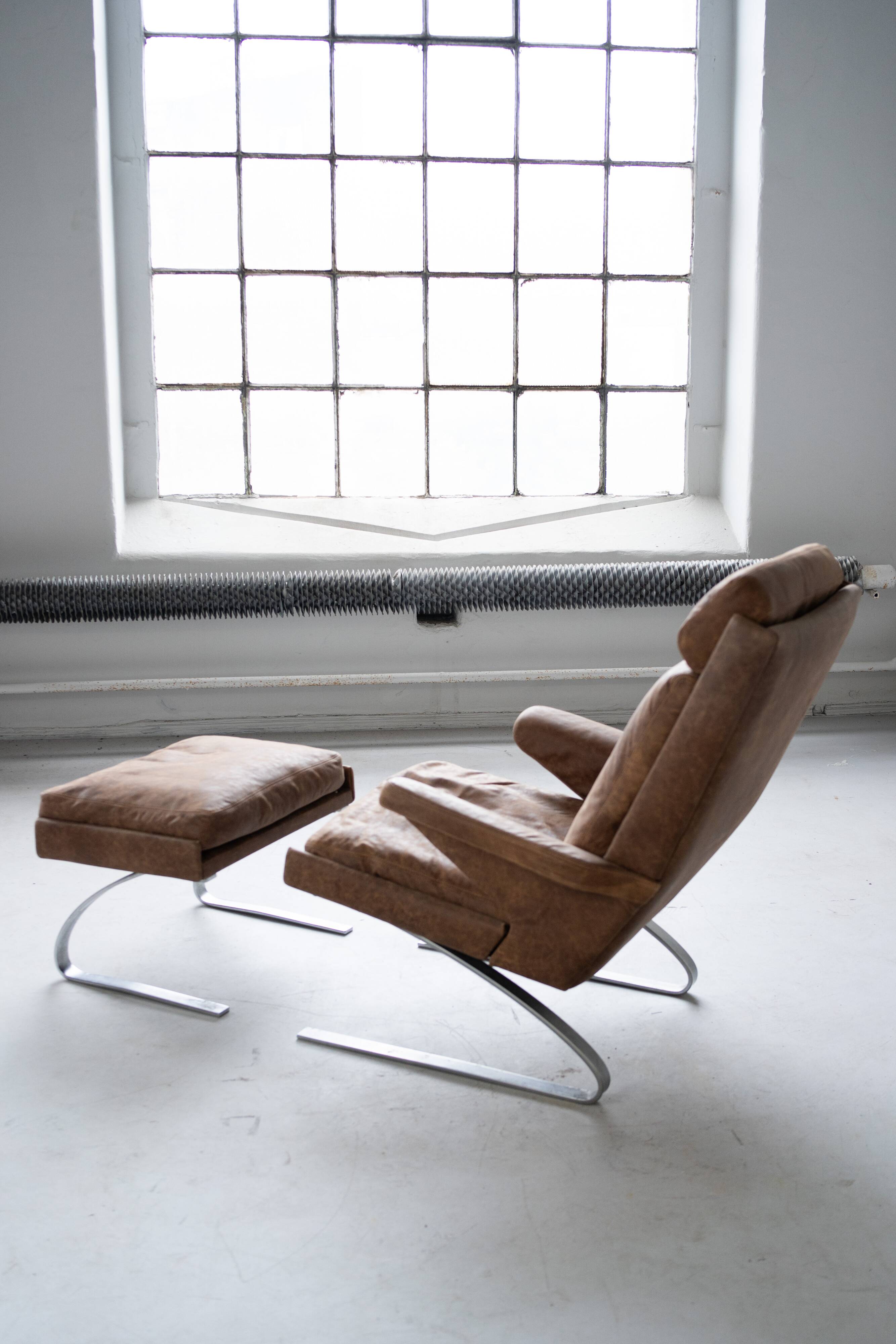 Vintage swing armchair and stool in leather by reinhold adolf for cor, 1970s, set of 2