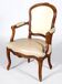 Louis XV period armchair in natural wood with convertible back carved with flowers