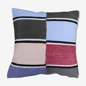 Housse de coussin tissé