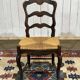 Set of 7 Louis XV style beech chairs with straw seats.