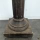 Fluted column side table in oak with a square top.