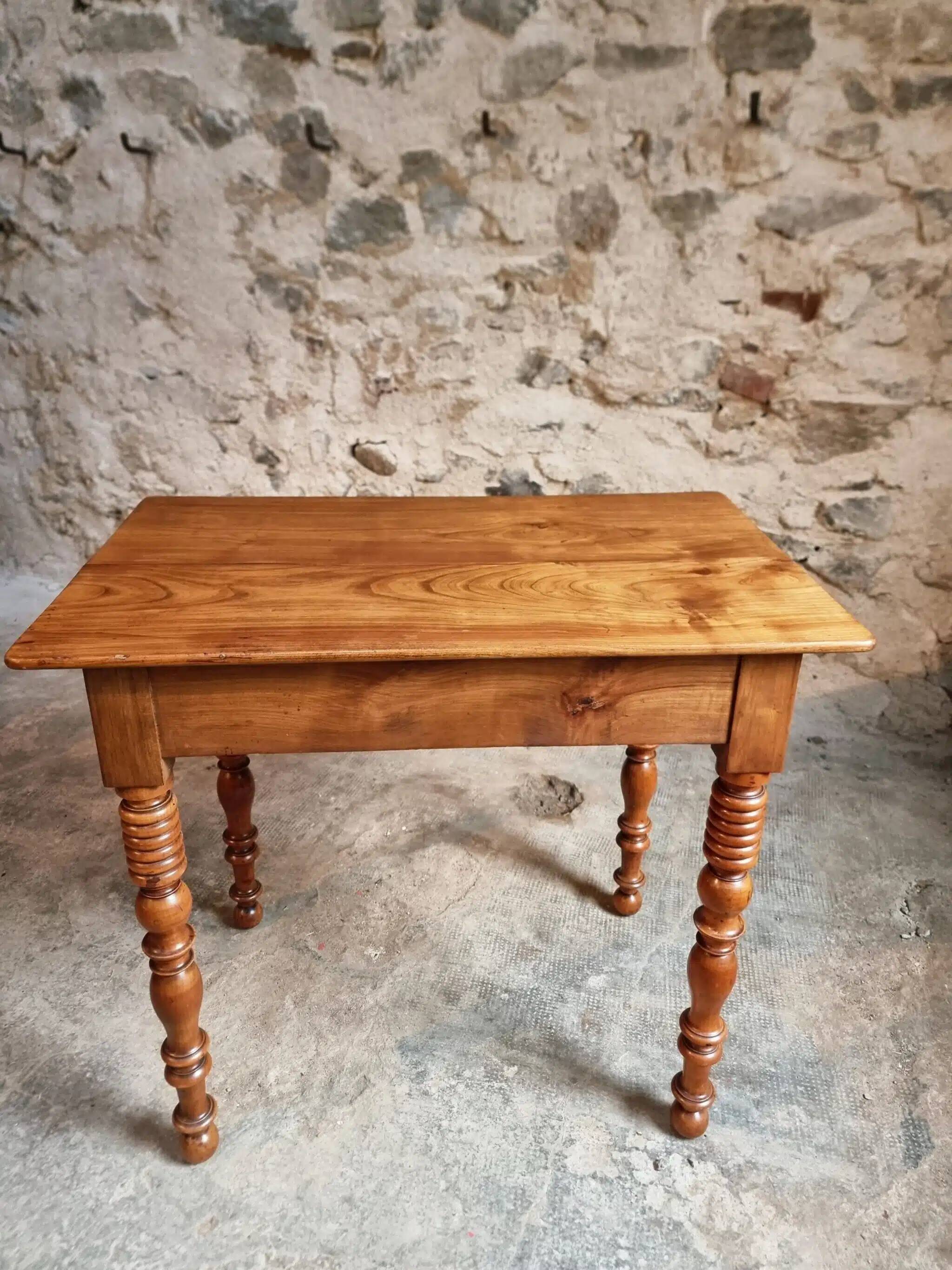 Small antique French writing table in walnut with a drawer, around 1900.