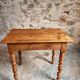 Small antique French writing table in walnut with a drawer, around 1900.