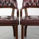 Set of two dark brown cowhide leather Chesterfield dining/side chairs