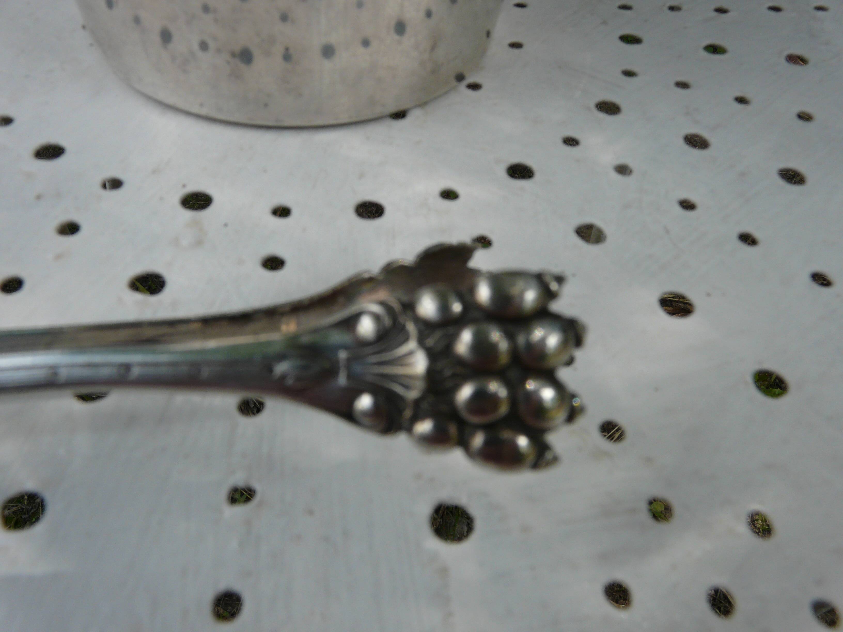 Silver metal ice bucket with its lion's pate tongs