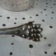 Silver metal ice bucket with its lion's pate tongs