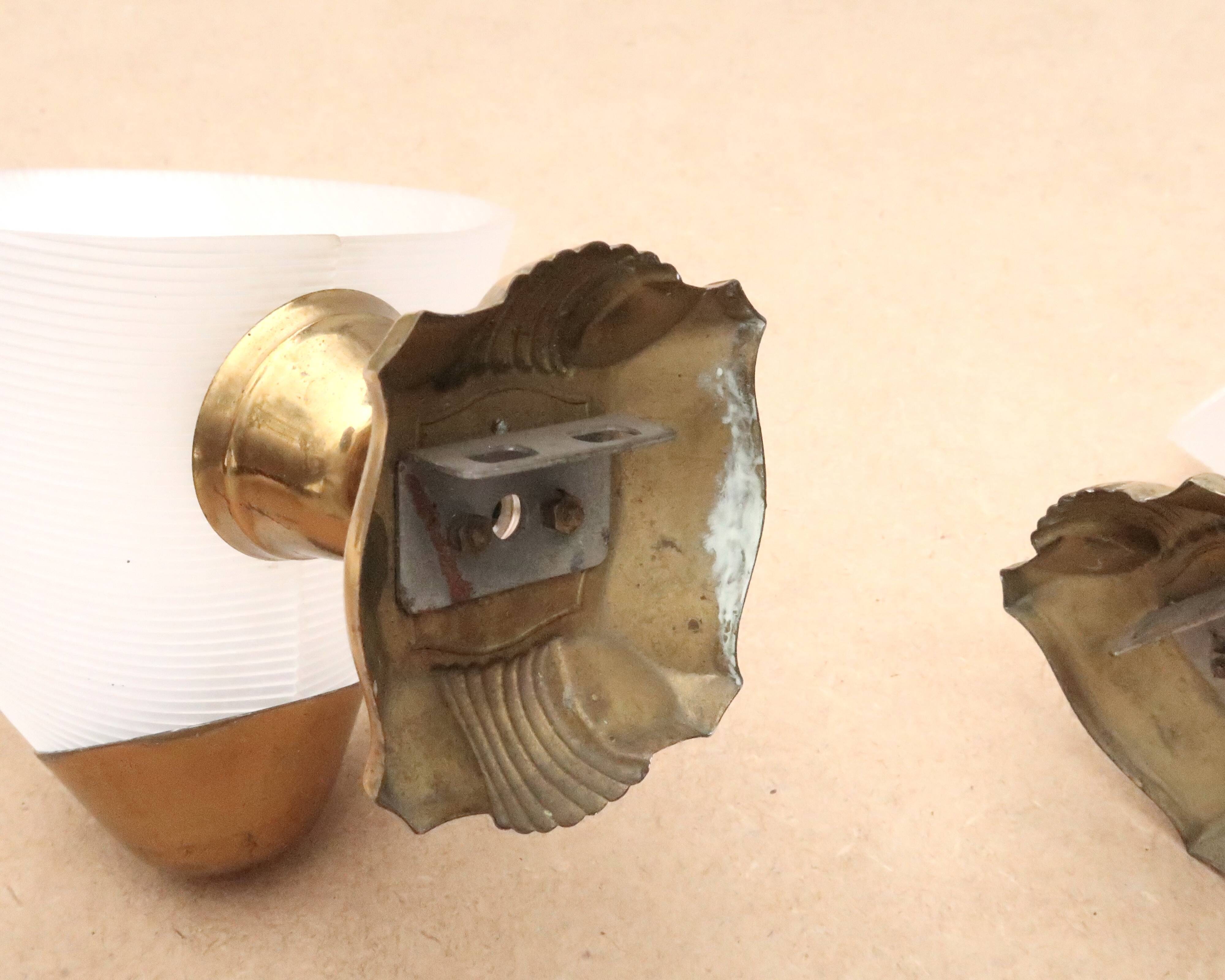 Pair of white and gold wall lights, 1950s