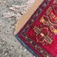 Vintage Afghan hand-knotted prayer rug with Islamic patterns.