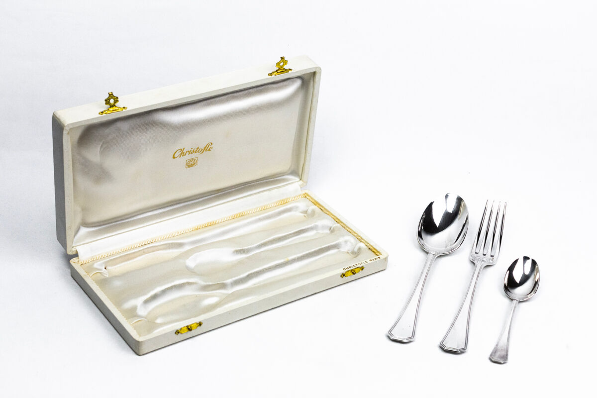 Three-piece birth set "America" — Christofle. 20th century.