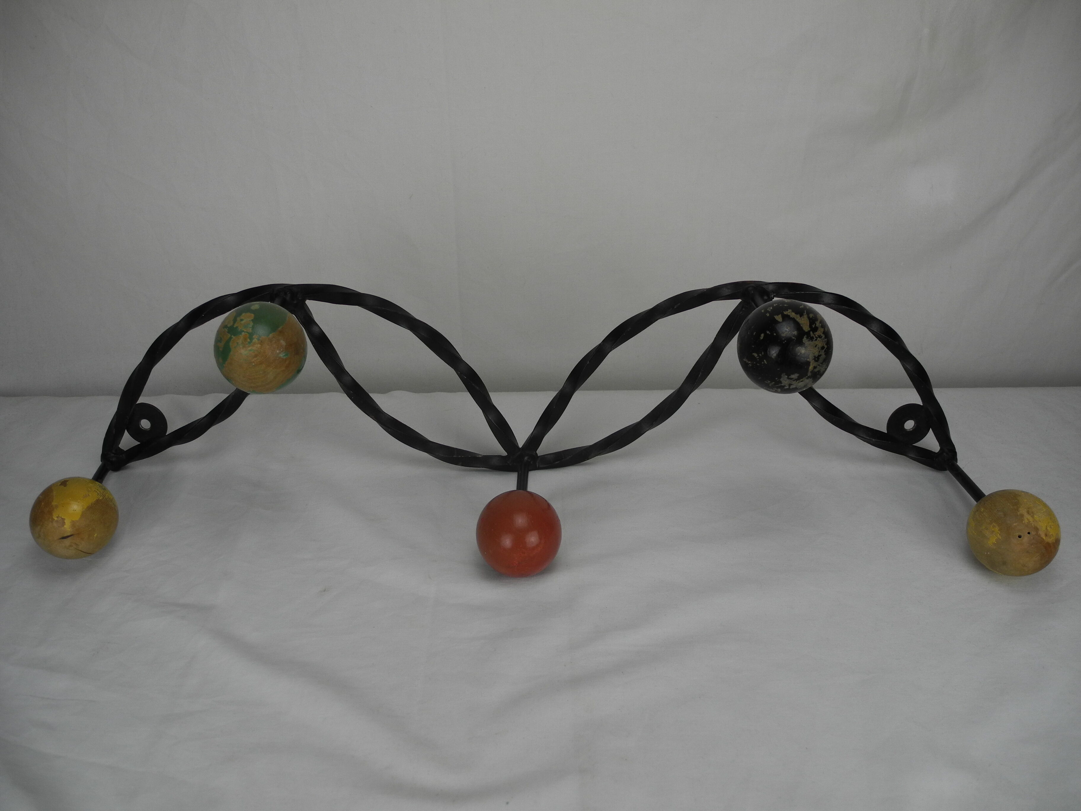 Old wrought iron coat rack