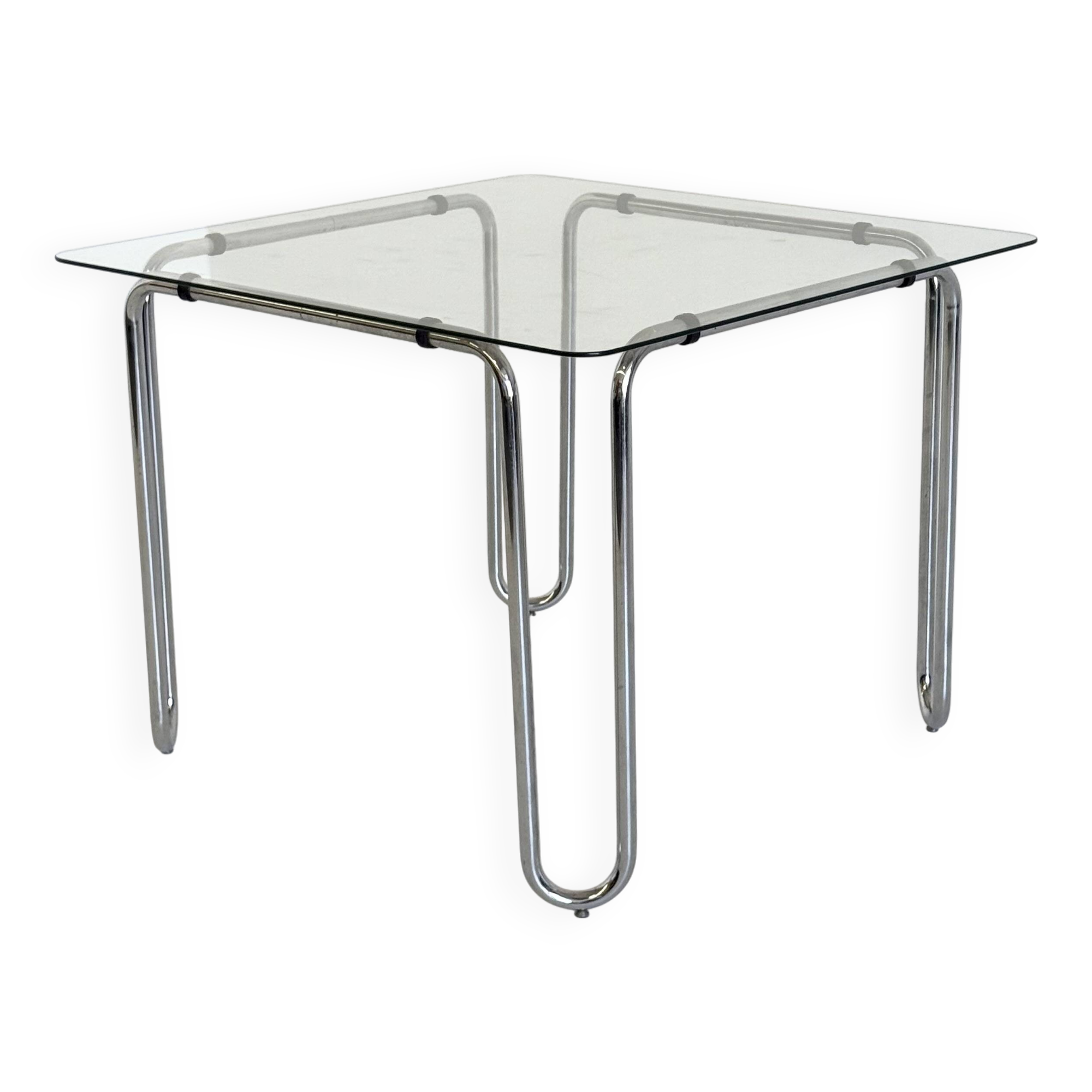 Italian vintage dining table with smooth glass and tubular frame base
