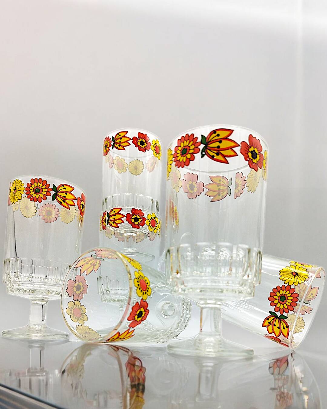 Vintage stemmed glass with floral decoration