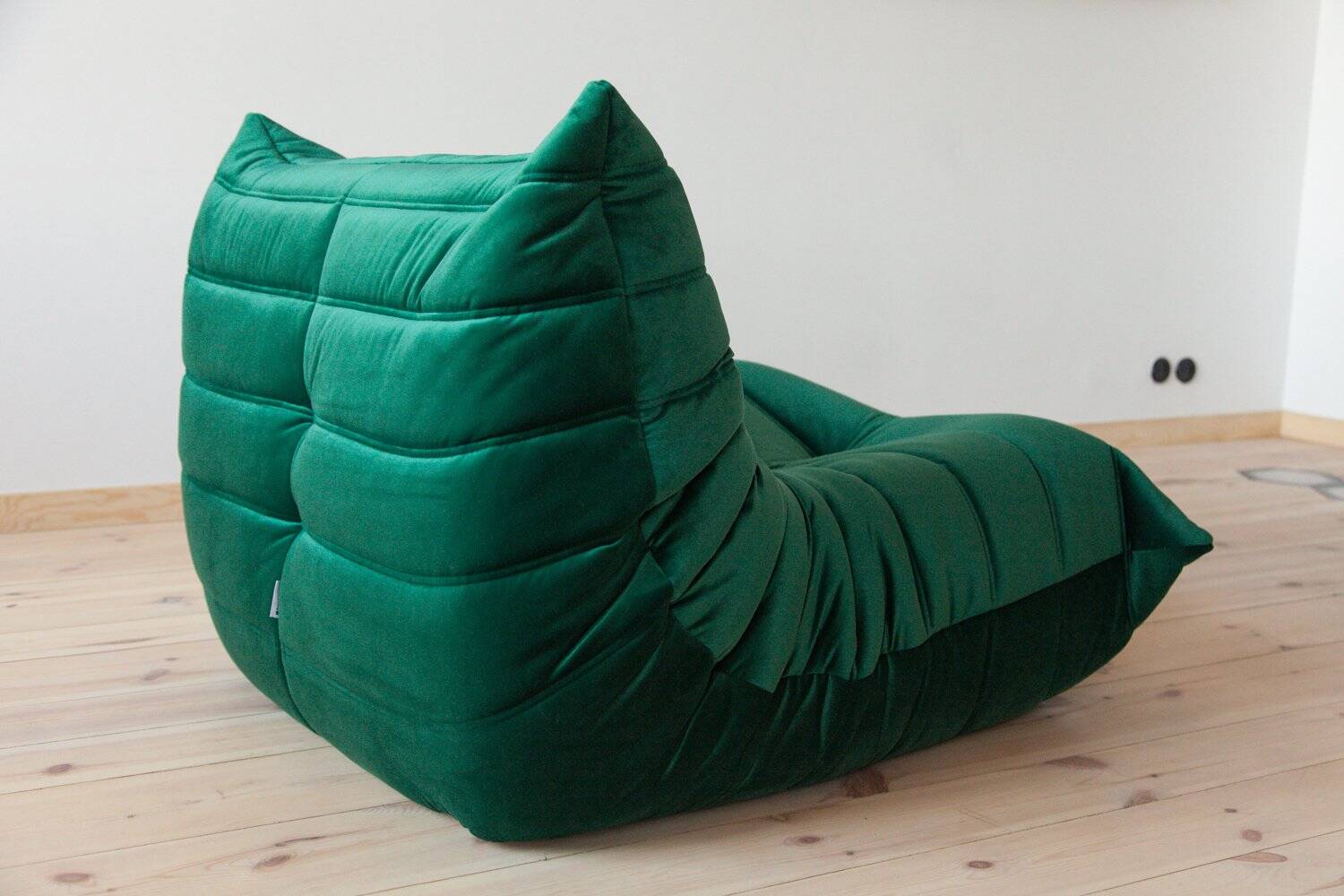 Togo lounge chair in bottle green velvet by Michel Ducaroy for Ligne Roset