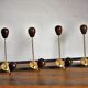 Coat rack varnished wood and gold metal