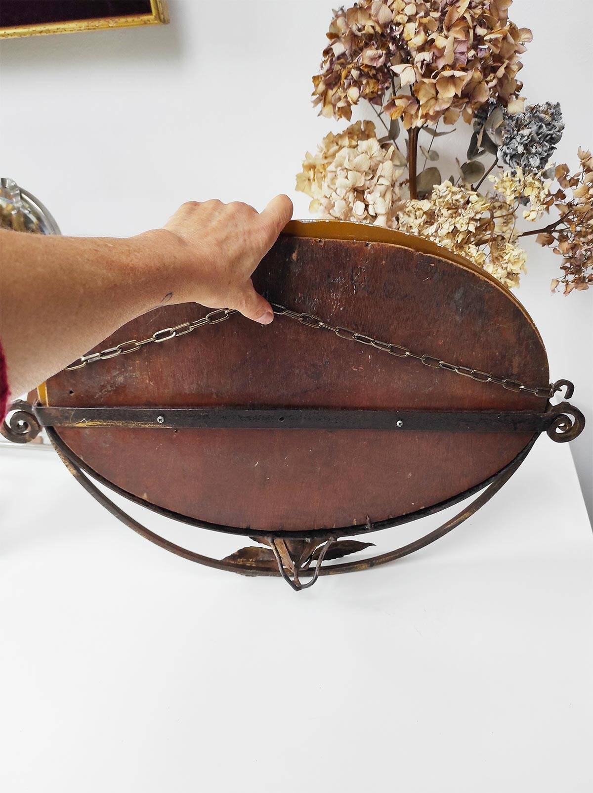 Old wrought iron mirror in the art deco style and period