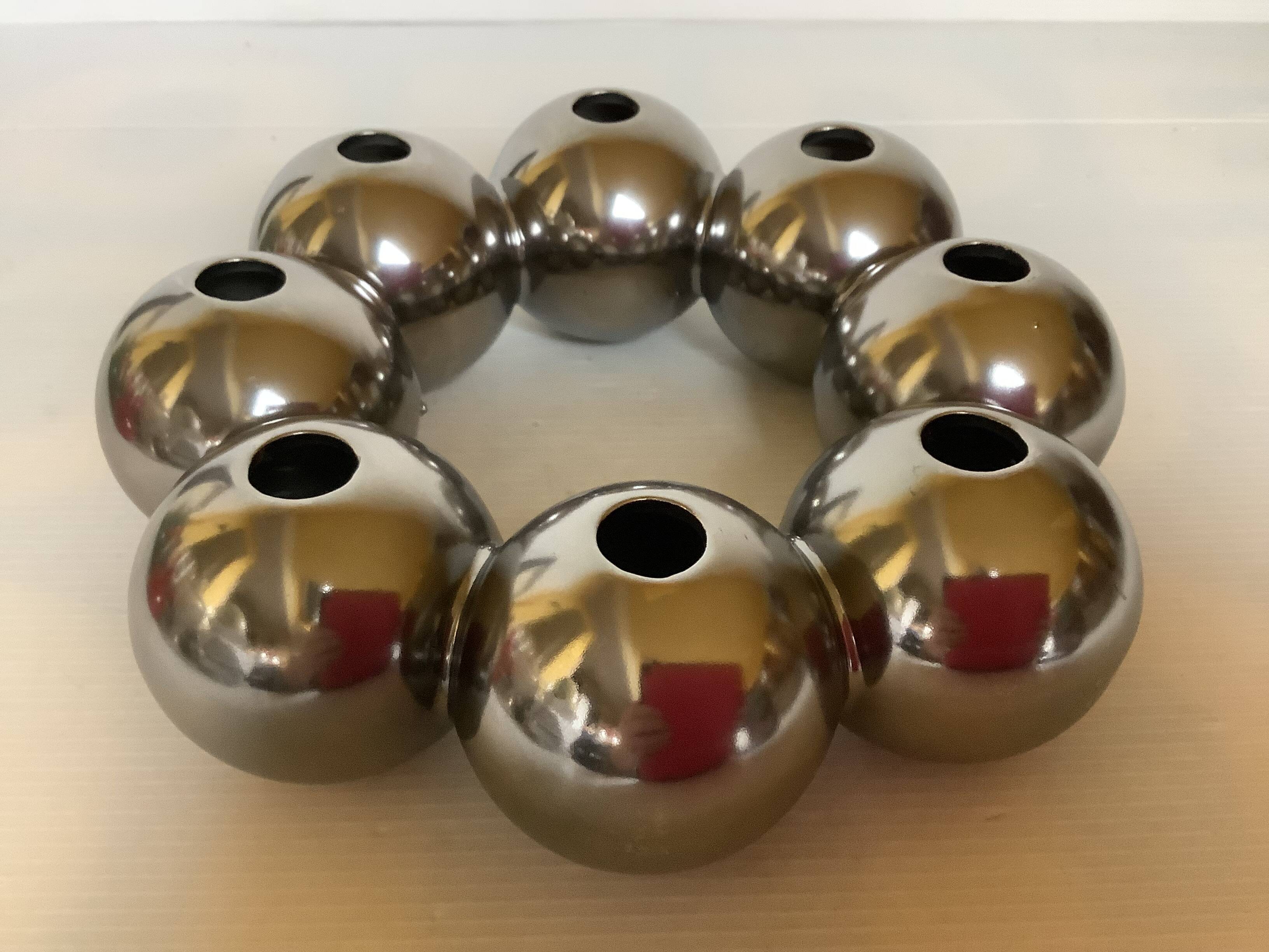 Silver flower vase in a crown shape.