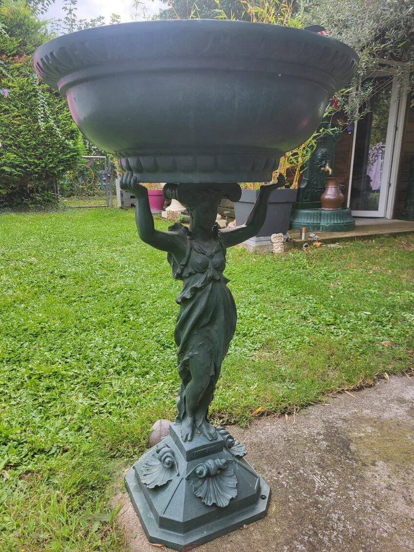 Cast iron caryatid fountain