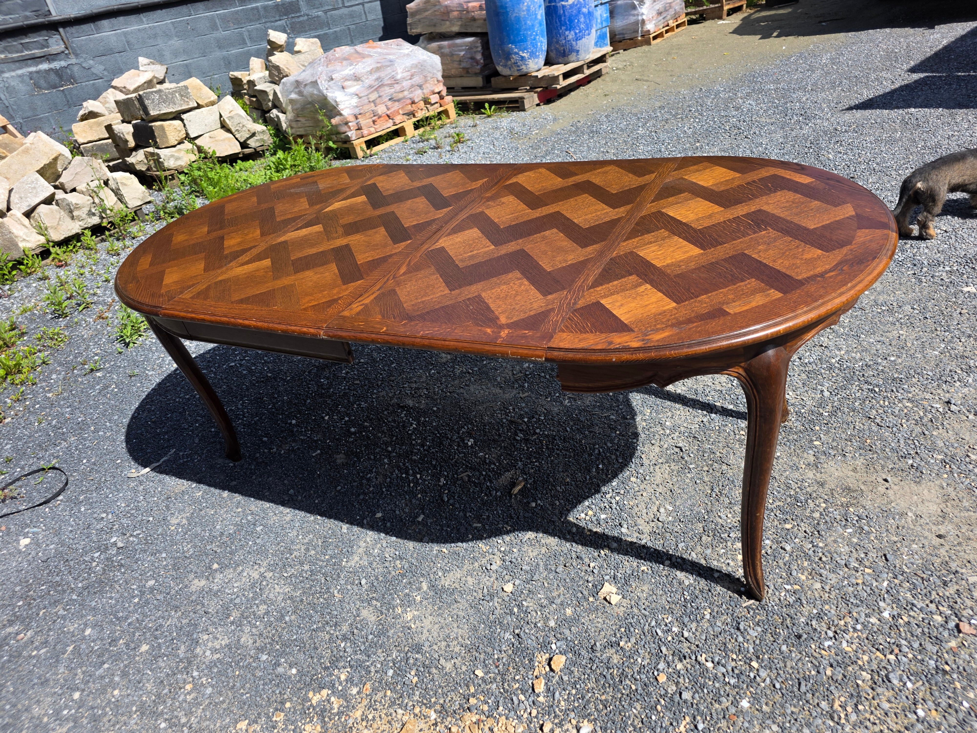 Extendable table in Louis XV style in oak (2 extensions)
