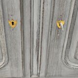 Grey patina furniture with three doors and three drawers