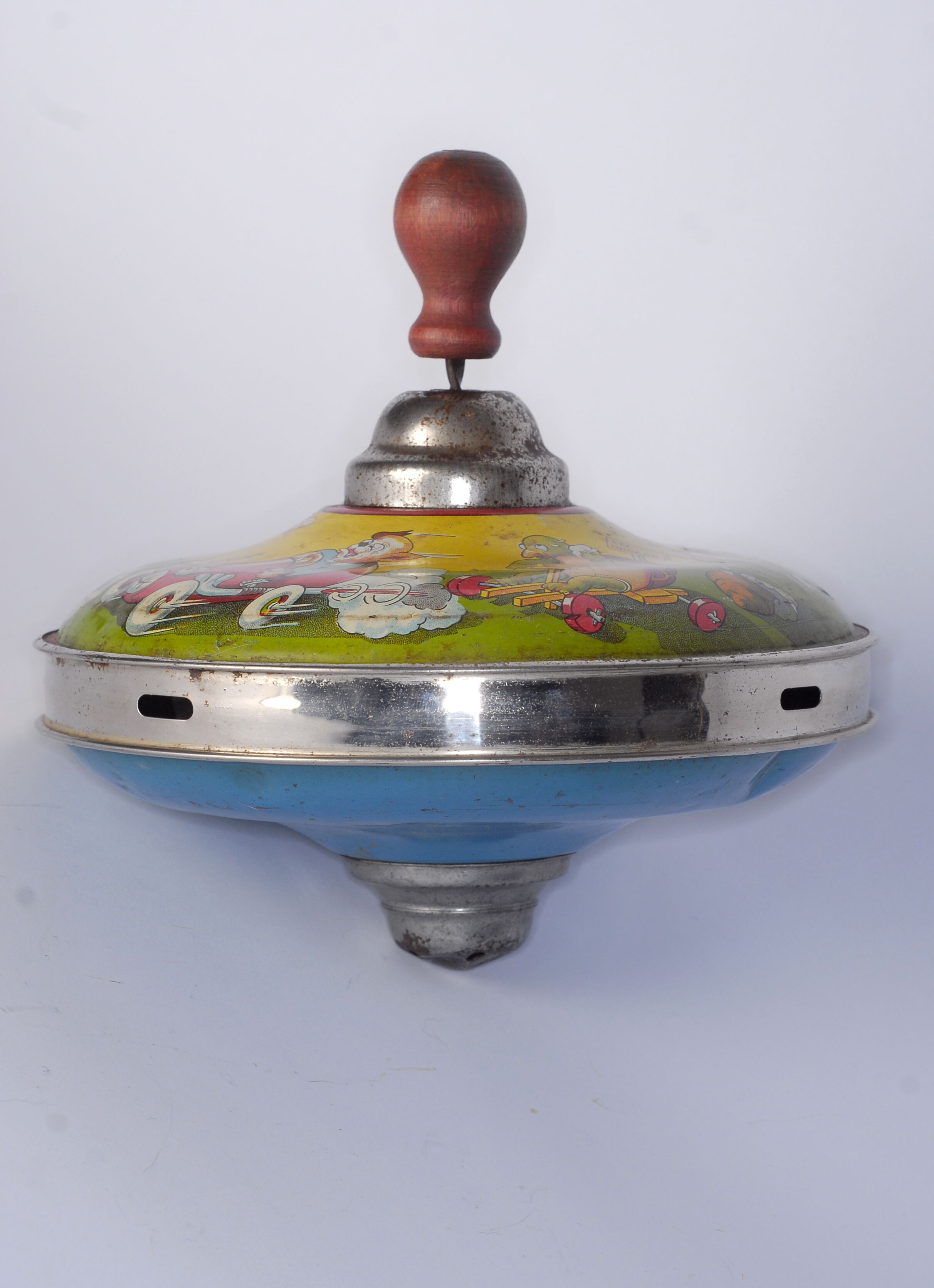 Old lithographed spinning top dating from the 1930