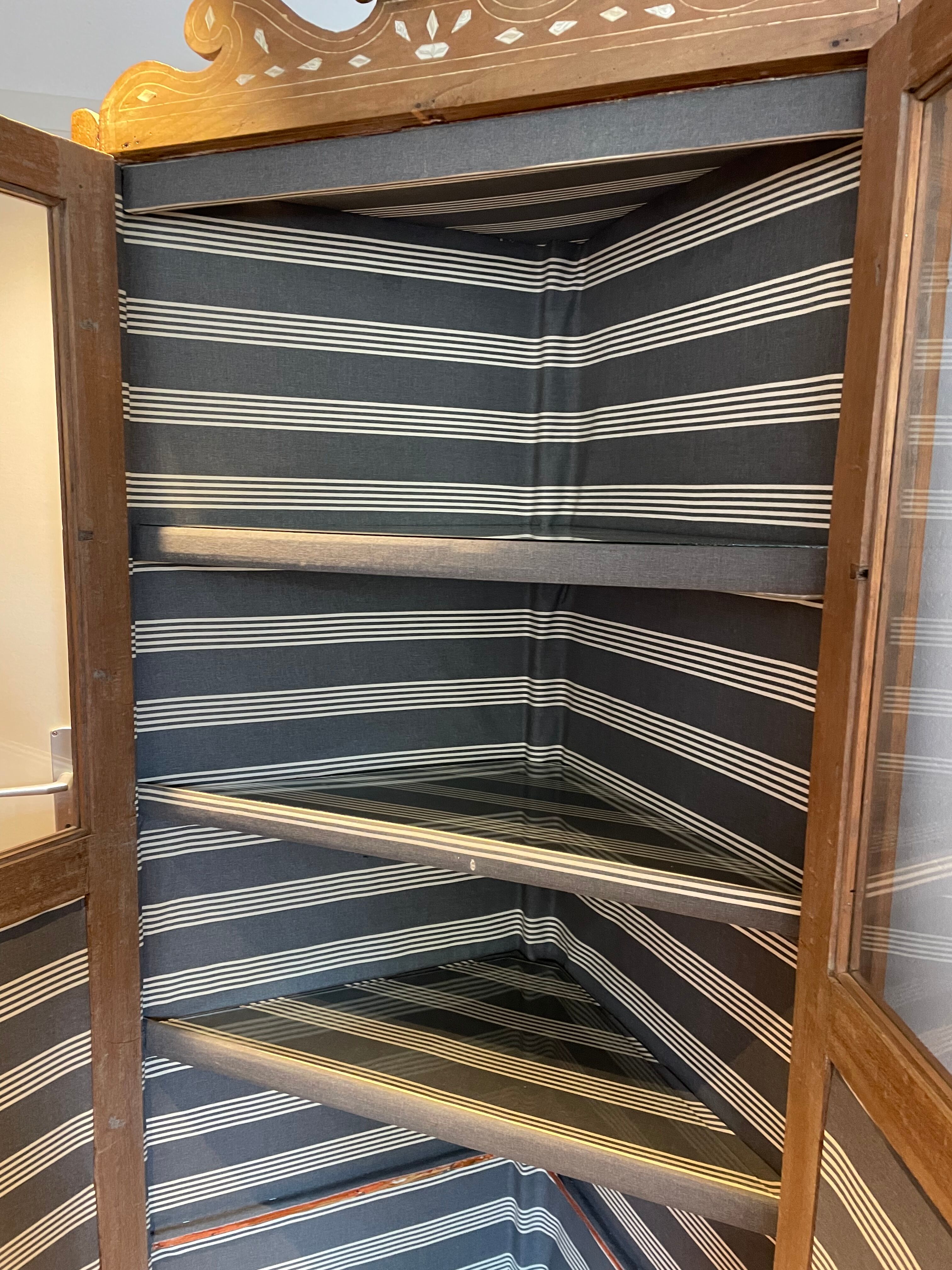 Oriental corner cabinet