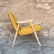 Fauteuil vintage pieds compas et accoudoirs en bois massif, since 1950