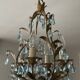 Antique Italian chandelier with cage and blue tassels